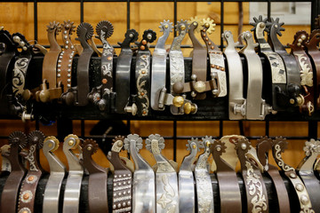 Spurs lined up for sale in a store in Scottsdale