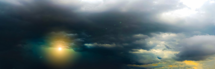 Panoramic view of beautiful thunderclouds. Beautiful dramatic  blue sky background. Rainy weather. Soft focus photo. Stormy sky.