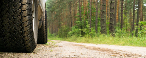All-terrain tires close-up on a forest road