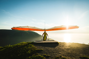 hang gliding at sun set 