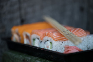 sushi with chopsticks