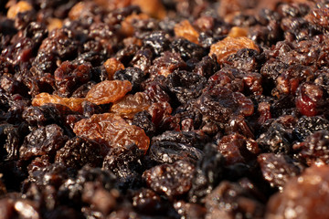Variety of dried up raisins macro shot with selective focus
