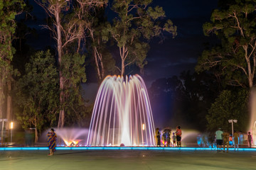 Colored musical water fountain at night. Shekvetili