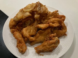 fried chicken wings and fried Mushroom on dish