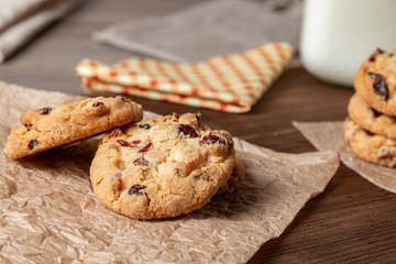 Obraz na płótnie Canvas Homemade cookies with raisins on a wooden table. Homemade snacks