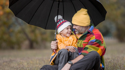 Tender scene father with son having fun spending tome together