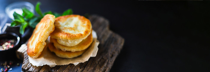 wrap flat bread tortillas langos flour and water fried dough homemade cooking Takeaway homemade langos food background top view copy space
