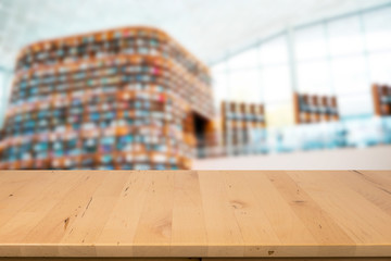 wood countertop in modern bookstore or library background