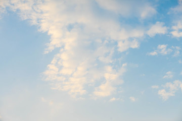 blue sky with white fluffy clouds 
