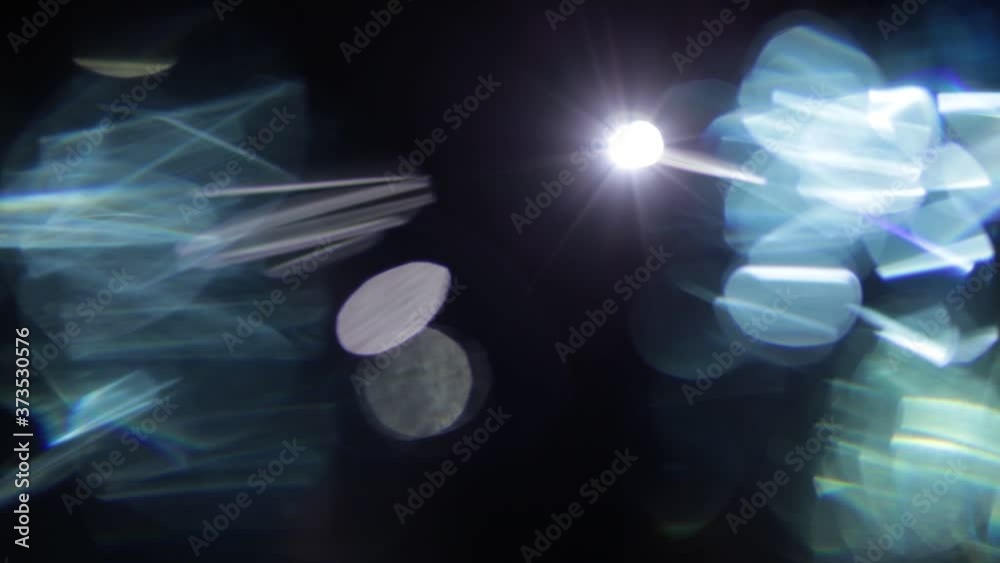 Aufkleber Easy to add lens flare effects for overlay designs or screen blending mode to make high-quality video. Abstract sun burst, digital flare, iridescent glare over black background.
