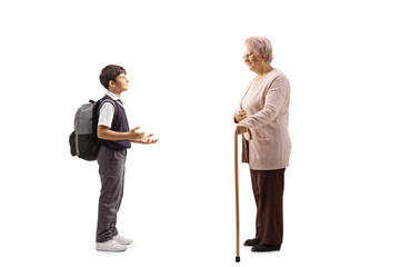 Fototapeta premium Schoolboy having a conversation with an elderly ladyface masks