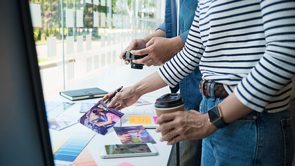 Advertising agency designer creative start-up team discussing ideas in office. 