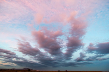 Sunrise Sundown Sanset Sky with colorful clouds, without birds, clear and worm evening