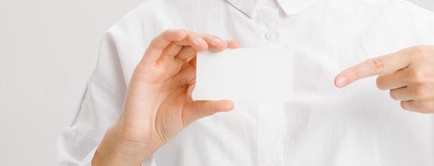  close-up portrait of a young businesswoman with Blank Business Card