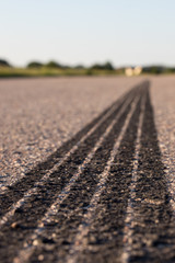 Tire footprints on asphalt