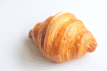 Close up fresh croissant on white background.