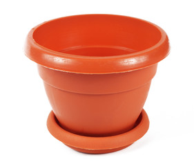 Empty brown plastic flower pot on white background, isolate, close-up