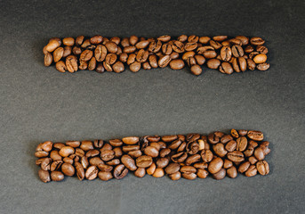 Coffee beans on black background and a place for an inscription.jpg
