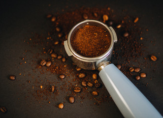 The coffee beans andcoffee tamper