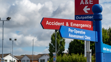 Hospital department signs at a UK hospital