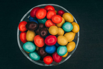 colorful chocolate candies in a glass bowl