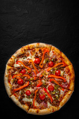 Pizza with Mozzarella cheese, Bolognese sauce, minced meat, pepper, tomato, bacon and vegetables....