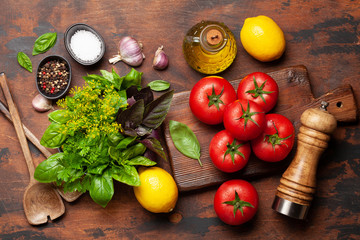 Italian cuisine ingredients. Tomatoes, herbs and spices