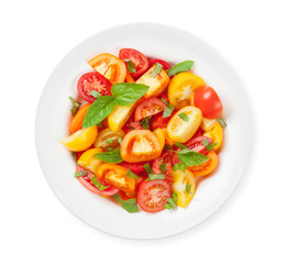 Fresh colorful tomatoes and basil salad