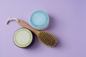 Obraz premium a jar of beldi and a crusher drainage brush for body massage