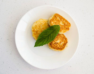 curd pancake with mint leaves for flavor.