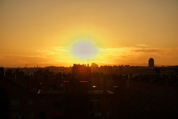 sunset over the city in the park