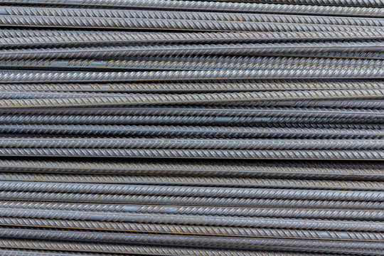 Brand new armature. Reinforcements steel bars stack. Close up steel construction armature. Construction rebar steel work reinforcement in conncrete structure.