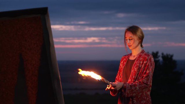 Young Girl Artist Sets FireTo Her Painting.