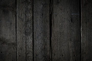Hard and dark wooden surface wallpaper background
