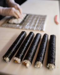 Roll the sushi