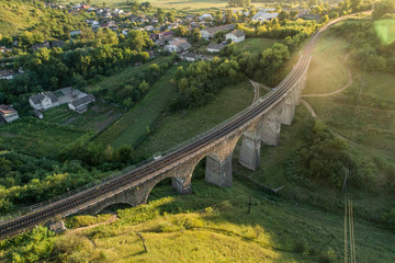 Fototapeta premium Aerial view of an old railway viaduct near Terebovlya village in Ternopil region, Ukraine.