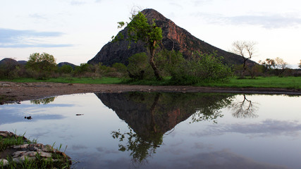 Tsodilo hill reflects on rain water
