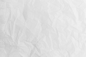 abstract background of crumpled white parchment texture close up