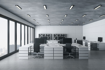 Modern coworking office interior with daylight.