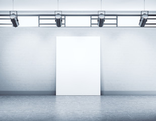 Modern empty gallery hall with blank vertical poster on wall