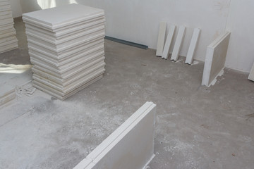 Material for building walls in a building. Construction of internal walls in the apartment using a plaster concrete plate with groove ridge. Tongue-and-groove gypsum blocks. Construction technologies
