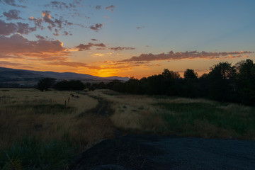 Obraz premium sunrise, over hills and river