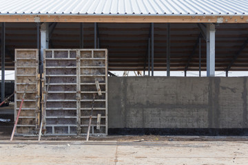 Obraz premium Concrete formwork at a construction site. Installation of reinforced concrete building walls