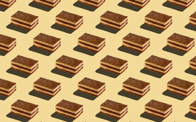 Trendy seamless food pattern - layered sponge cakes on a pastel background, minimal food isometric concept texture.