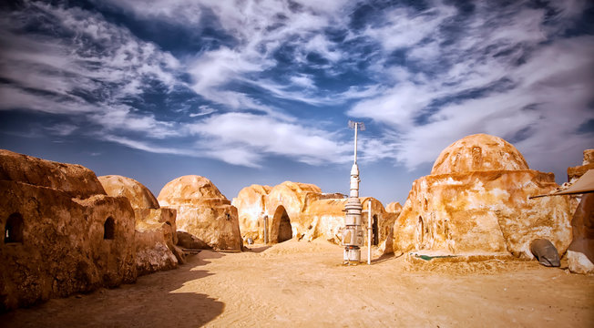Star Wars decoration in Sahara desert. Appearance of original set was used in film. Ong Jewel Star Wars Location in Tunisia. Buildings in Ong Jemel, Tunisia. Place near lake