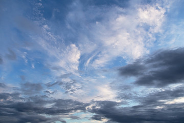 Naklejka na ściany i meble Beautiful blue sky with white and grey cirrus clouds
