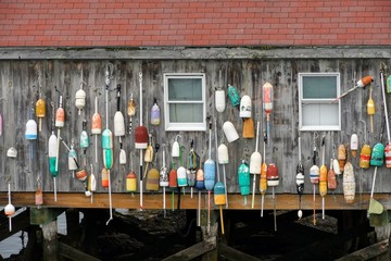Lobster Trap Markers on a Fishing Shack in New England
