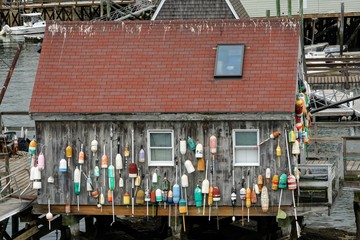 Lobster Trap Markers on a Fishing Shack in New England