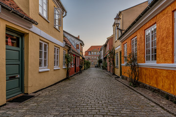 Fototapeta na wymiar Old colorful houses in a cobblestone-street
