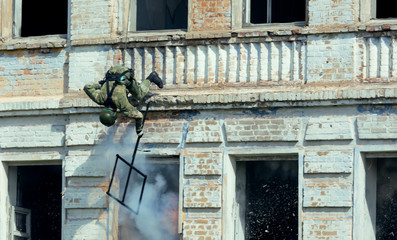 Special forces soldiers storm the walls